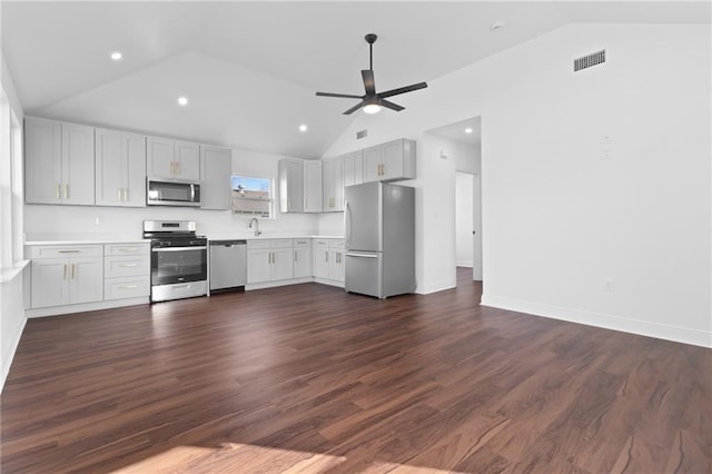 507 Westwego Ave, Westwego, LA 70094 - kitchen featuring stainless steel appliances, lofted ceiling, a ceiling fan, light countertops, and dark wood finished floors