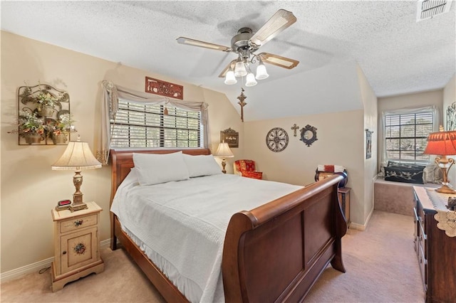 101 E Queensbury Dr, Slidell, LA 70461 - bedroom featuring light colored carpet, a textured ceiling, ceiling fan, and lofted ceiling