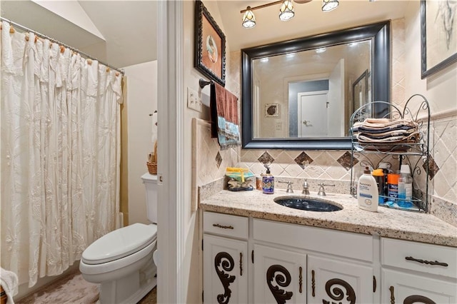 101 E Queensbury Dr, Slidell, LA 70461 - full bathroom featuring vanity, decorative backsplash, and a shower with shower curtain
