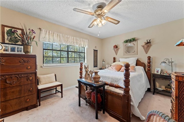 101 E Queensbury Dr, Slidell, LA 70461 - bedroom featuring light carpet, a textured ceiling, and a ceiling fan
