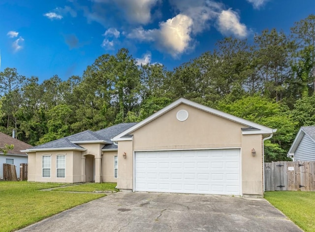 2143 Summertree Dr, Slidell, LA 70460 - view of front facade featuring stucco siding, driveway, a shingled roof, and a garage