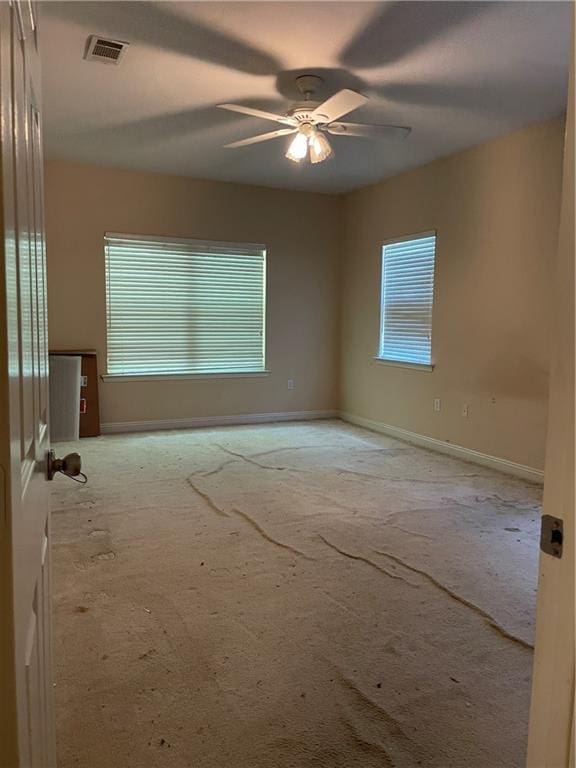 2143 Summertree Dr, Slidell, LA 70460 - carpeted spare room featuring ceiling fan and baseboards