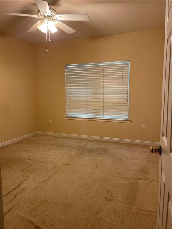 2143 Summertree Dr, Slidell, LA 70460 - carpeted empty room featuring a ceiling fan and baseboards