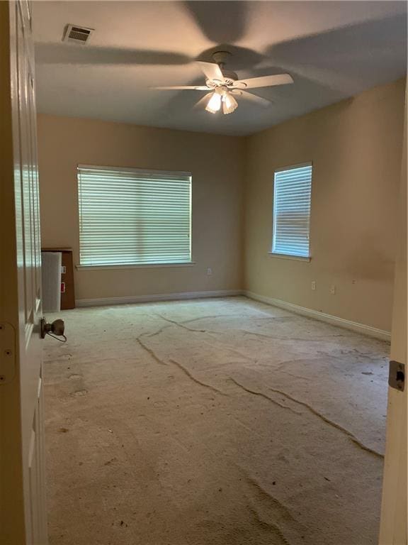 2143 Summertree Dr, Slidell, LA 70460 - spare room featuring carpet and a ceiling fan