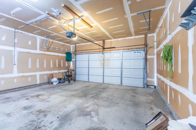 2143 Summertree Dr, Slidell, LA 70460 - garage featuring a garage door opener