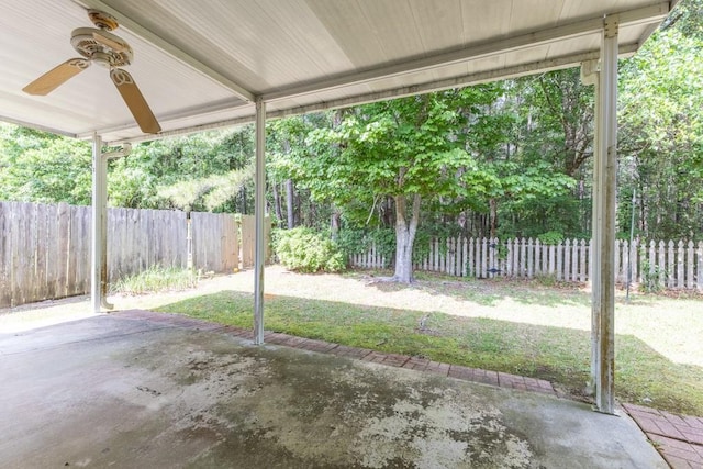 2143 Summertree Dr, Slidell, LA 70460 - fenced backyard with a ceiling fan and a patio