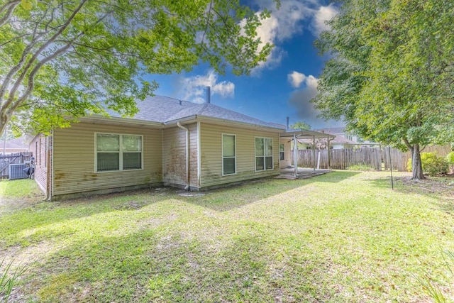 2143 Summertree Dr, Slidell, LA 70460 - rear view of property with a patio and roof with shingles