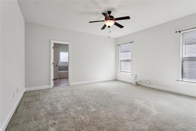 386 Knollwood Ln, Slidell, LA 70458 - empty room featuring carpet flooring and a ceiling fan