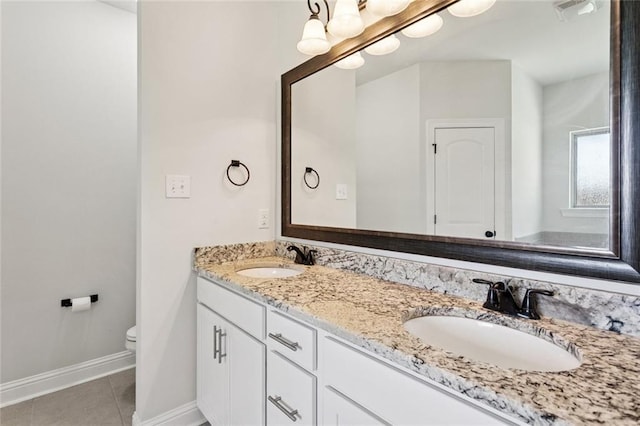 386 Knollwood Ln, Slidell, LA 70458 - bathroom with double vanity and tile patterned floors
