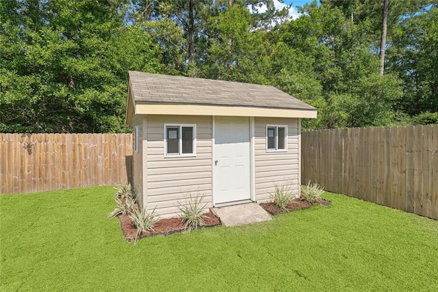 386 Knollwood Ln, Slidell, LA 70458 - view of shed with a fenced backyard