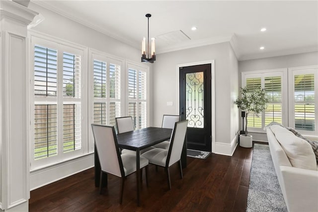 172 River Oaks Dr, La Place, LA 70068 - dining area featuring dark wood-type flooring, healthy amount of natural light, ornamental molding, recessed lighting, and a chandelier