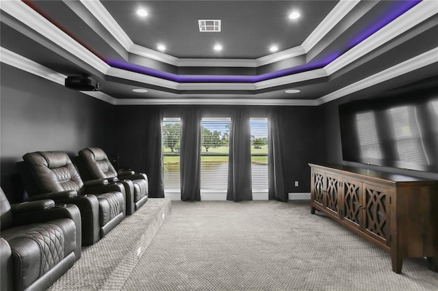 172 River Oaks Dr, La Place, LA 70068 - cinema room featuring ornamental molding, carpet flooring, a tray ceiling, and recessed lighting