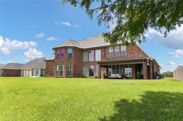 172 River Oaks Dr, La Place, LA 70068 - rear view of property with brick siding