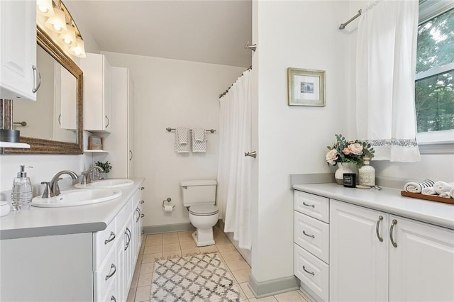 5237 Meadowdale St, Metairie, LA 70006 - bathroom featuring vanity, tile patterned floors, and a shower with shower curtain