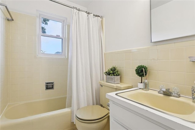 5237 Meadowdale St, Metairie, LA 70006 - bathroom featuring vanity, shower / bath combo, and tile walls