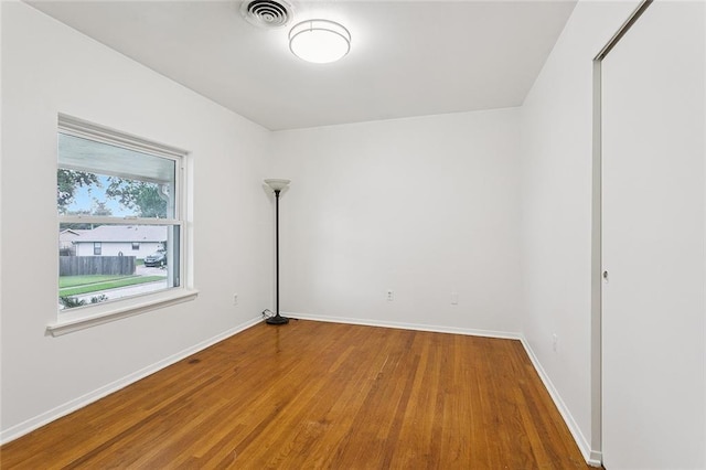 5237 Meadowdale St, Metairie, LA 70006 - empty room featuring wood finished floors and baseboards