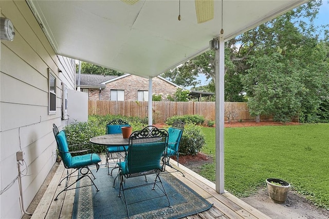 5237 Meadowdale St, Metairie, LA 70006 - fenced backyard featuring outdoor dining area and a wooden deck