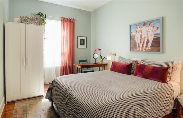 1932 Lapeyrouse St, New Orleans, LA 70116 - bedroom featuring wood finished floors