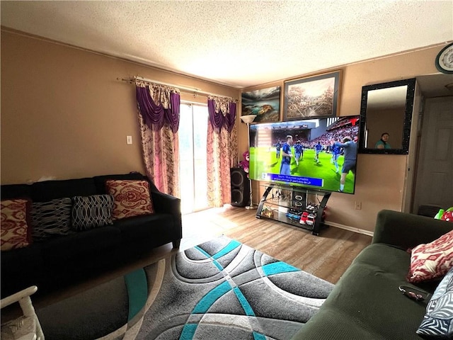 4325 Loire Dr, Kenner, LA 70065 - living area featuring wood finished floors and a textured ceiling