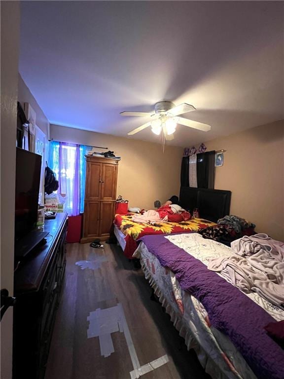 4325 Loire Dr, Kenner, LA 70065 - bedroom with dark wood-type flooring and a ceiling fan