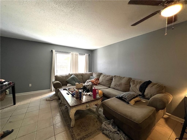 4325 Loire Dr, Kenner, LA 70065 - living room featuring a ceiling fan, light tile patterned flooring, and a textured ceiling