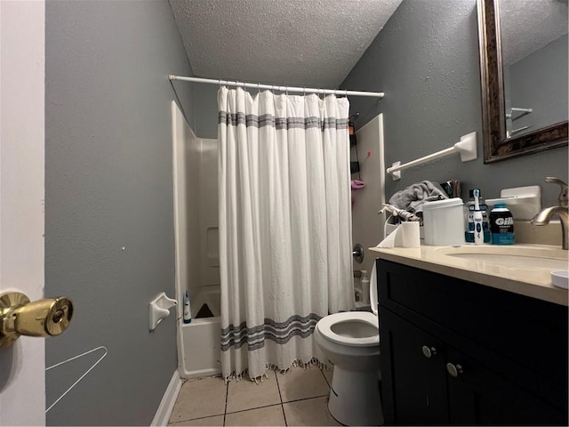 4325 Loire Dr, Kenner, LA 70065 - bathroom featuring a textured ceiling, tile patterned floors, shower / bath combo with shower curtain, and vanity