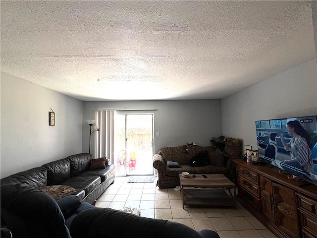 4325 Loire Dr, Kenner, LA 70065 - living area featuring light tile patterned floors and a textured ceiling