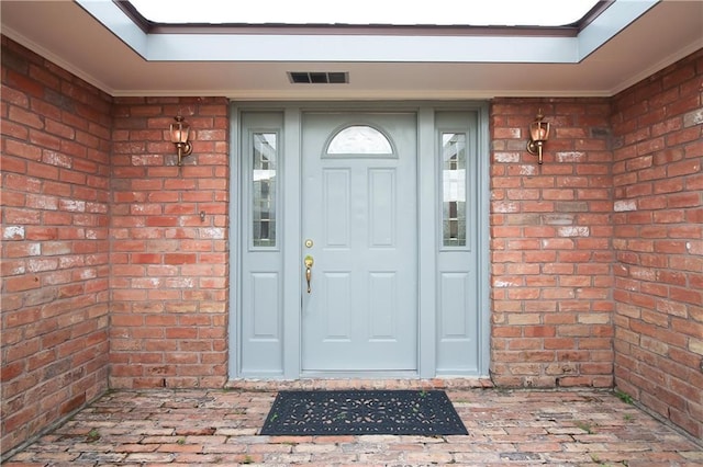 2137 Carmel Valley Dr, La Place, LA 70068 - doorway to property featuring brick siding