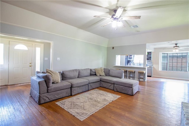 2137 Carmel Valley Dr, La Place, LA 70068 - living area featuring a ceiling fan, wood finished floors, and lofted ceiling