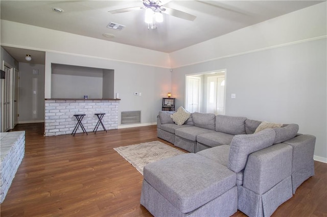 2137 Carmel Valley Dr, La Place, LA 70068 - living room featuring a ceiling fan and wood finished floors