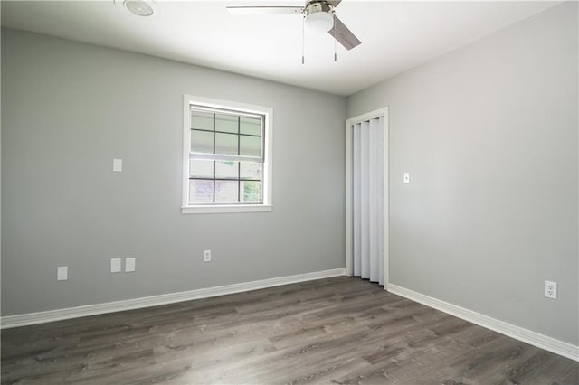 2137 Carmel Valley Dr, La Place, LA 70068 - empty room featuring dark wood-style floors and ceiling fan