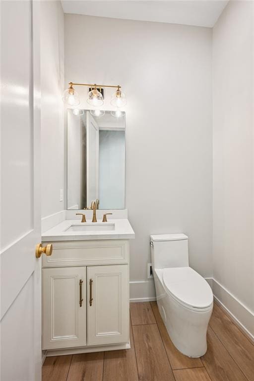 1023 W 19th Ave, Covington, LA 70433 - half bath featuring wood finished floors and vanity