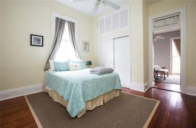252224 General Pershing St, New Orleans, LA 70115 - bedroom featuring dark wood-type flooring, a closet, and ceiling fan