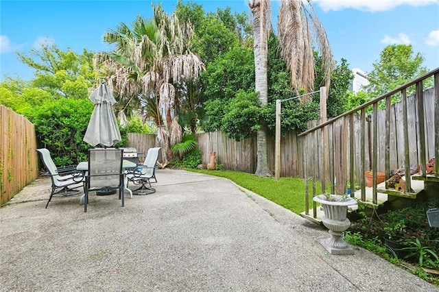 252224 General Pershing St, New Orleans, LA 70115 - fenced backyard featuring a patio area and outdoor dining space