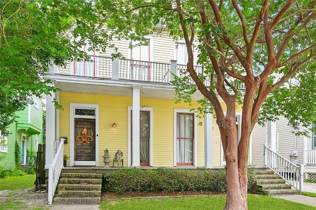 252224 General Pershing St, New Orleans, LA 70115 - view of front facade featuring a balcony and covered porch