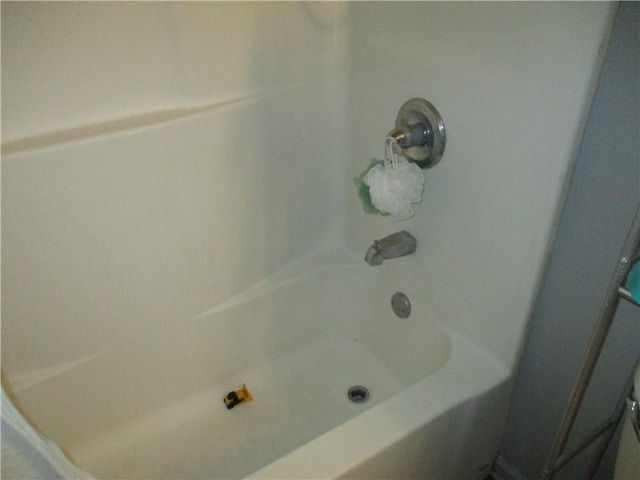 9025 Hickory St, New Orleans, LA 70118 - bathroom with bathtub / shower combination
