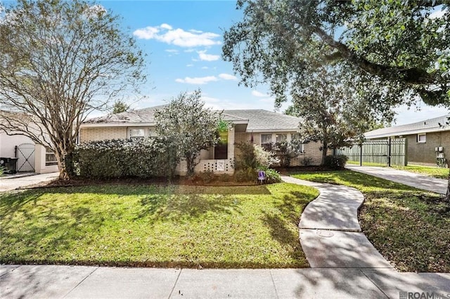 432 Emerald St, New Orleans, LA 70124 - view of front of home featuring brick siding and a carport