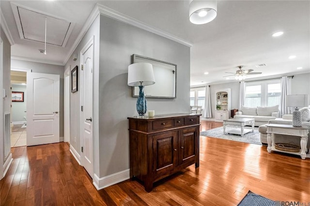432 Emerald St, New Orleans, LA 70124 - hallway with attic access, crown molding, hardwood / wood-style flooring, and recessed lighting