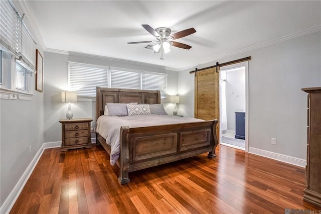432 Emerald St, New Orleans, LA 70124 - bedroom with hardwood / wood-style flooring, a barn door, crown molding, a ceiling fan, and ensuite bathroom
