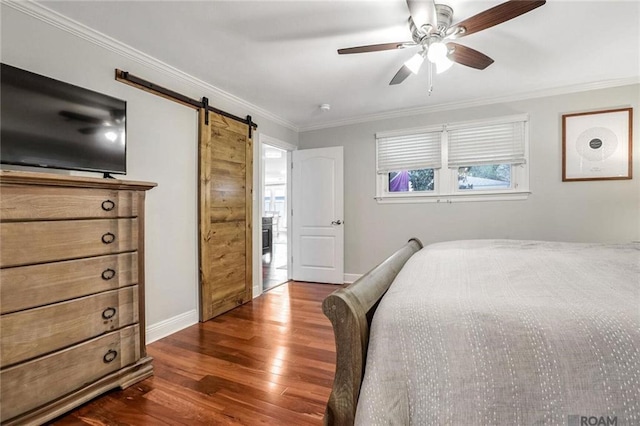 432 Emerald St, New Orleans, LA 70124 - bedroom featuring dark wood-type flooring, a barn door, crown molding, and ceiling fan
