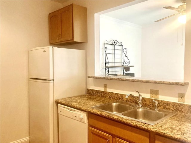 704 General Pershing St Unit 704, New Orleans, LA 70115 - kitchen featuring white appliances, brown cabinetry, and a ceiling fan