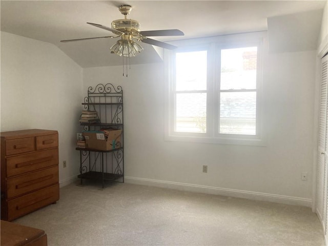 704 General Pershing St Unit 704, New Orleans, LA 70115 - bedroom with light carpet, vaulted ceiling, and ceiling fan