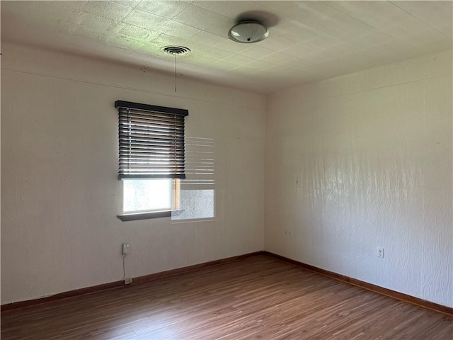 490 Lions St, Jefferson, LA 70121 - empty room featuring wood finished floors and baseboards