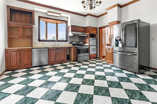 349 Vallette St, New Orleans, LA 70114 - kitchen with stainless steel appliances, under cabinet range hood, crown molding, a chandelier, and brown cabinets