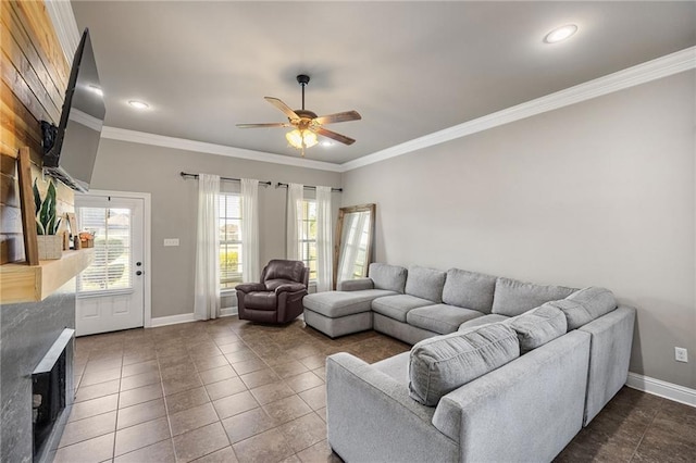 42467 Harlan Pl, Ponchatoula, LA 70454 - living area with ceiling fan, crown molding, a fireplace, recessed lighting, and dark tile patterned flooring