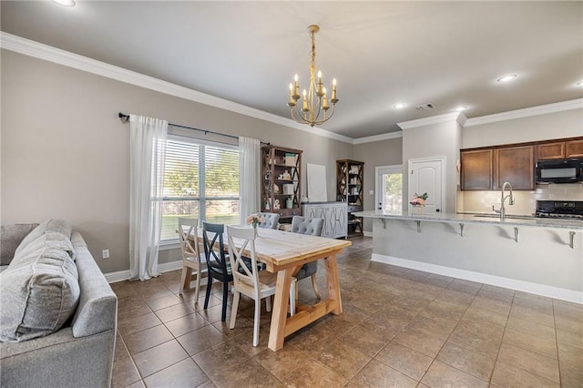 42467 Harlan Pl, Ponchatoula, LA 70454 - dining area with a chandelier, ornamental molding, and recessed lighting