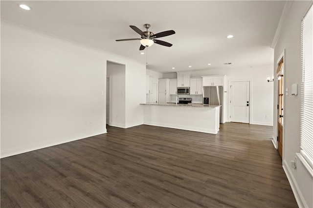 16205 Chandler Pl, Hammond, LA 70403 - unfurnished living room with recessed lighting, ceiling fan, ornamental molding, and dark wood finished floors