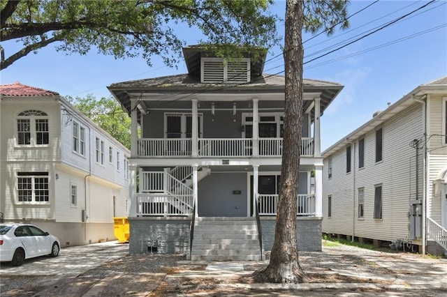 1815 S White St, New Orleans, LA 70125 - view of front of home with stairway and a porch