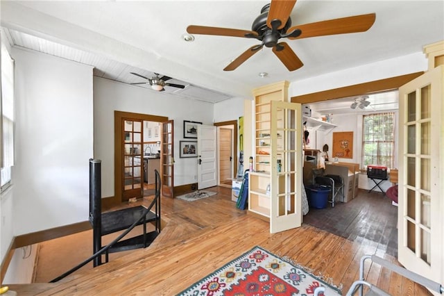 1815 S White St, New Orleans, LA 70125 - interior space with french doors, wood finished floors, and ceiling fan