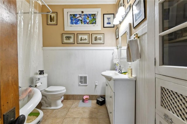 1815 S White St, New Orleans, LA 70125 - full bath featuring vanity, a wainscoted wall, tile patterned floors, heating unit, and a shower with curtain